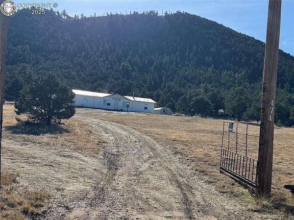 6.4 Acres of Residential Land with Home for Sale in Cotopaxi, Colorado