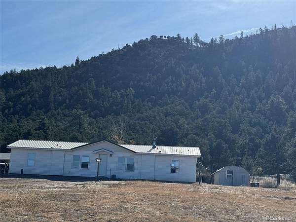 6.4 Acres of Land with Home for Sale in Cotopaxi, Colorado
