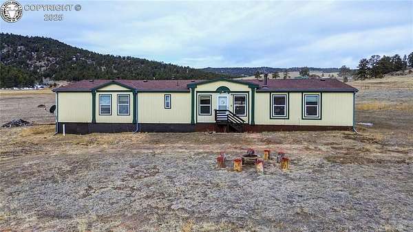 5 Acres of Residential Land with Home for Sale in Florissant, Colorado