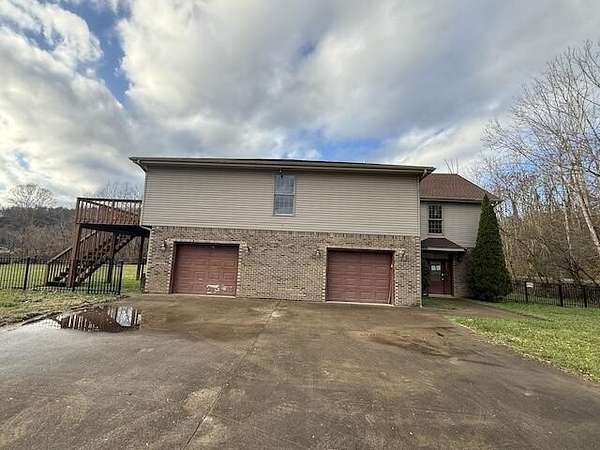 2 Acres of Residential Land with Home for Sale in Keith, Kentucky