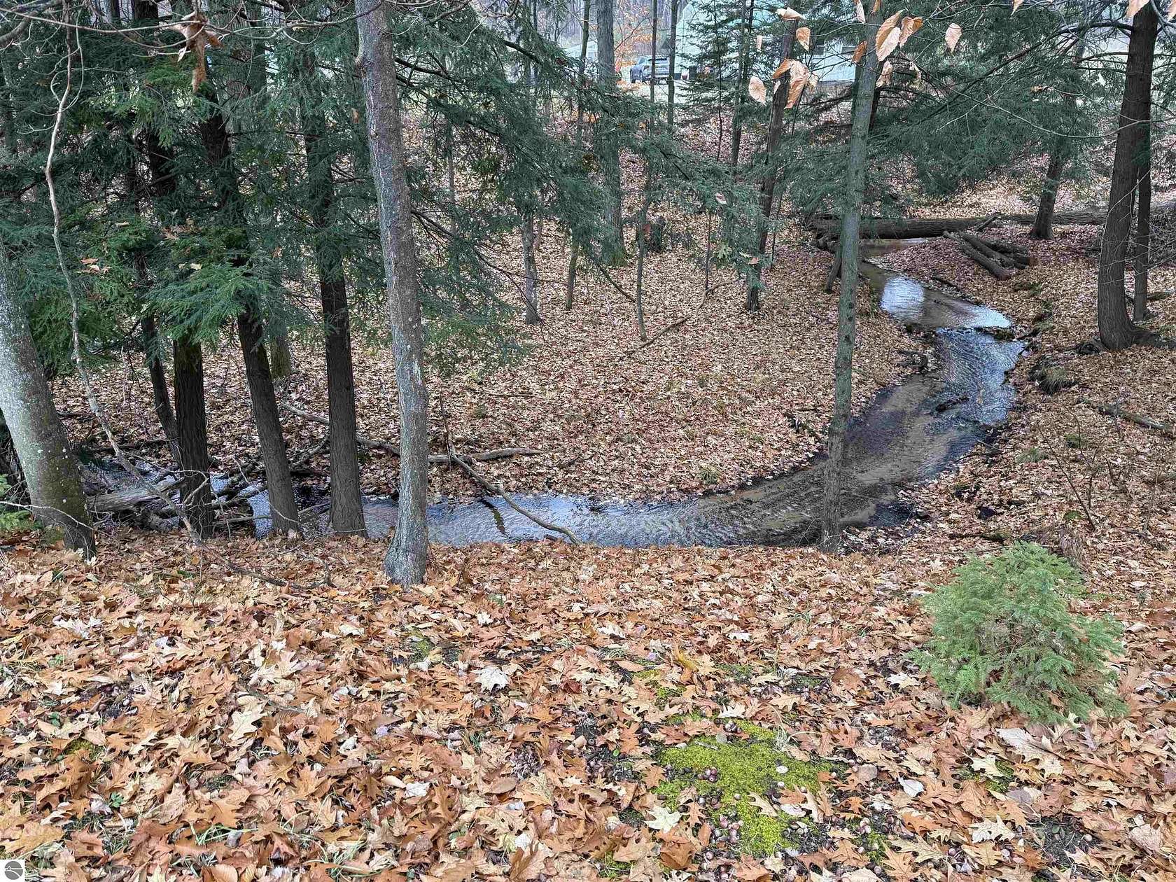 1.5 Acres of Land with Home for Sale in Harrietta, Michigan