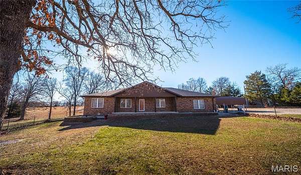 7.17 Acres of Residential Land with Home for Sale in Lebanon, Missouri