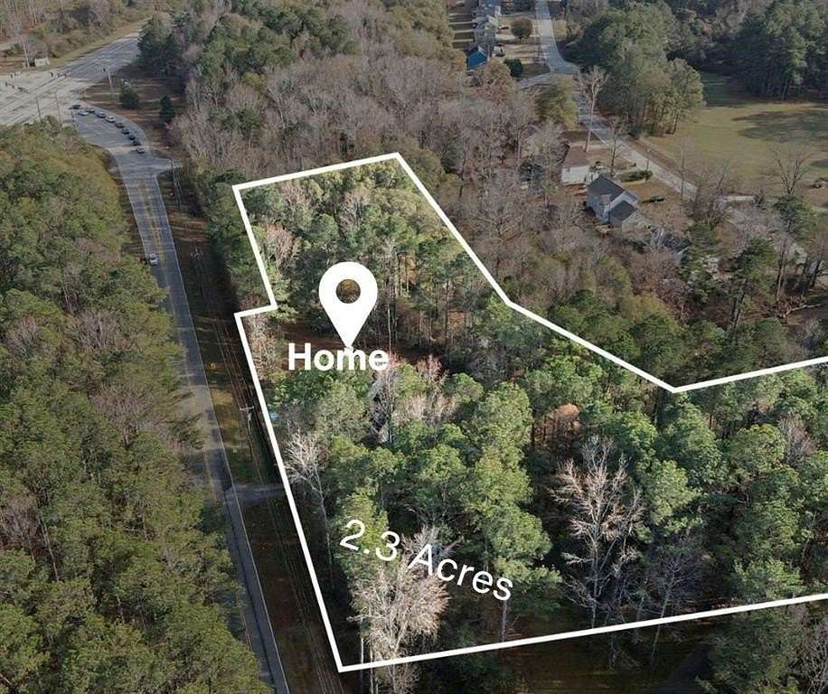 2.3 Acres of Residential Land with Home for Sale in Powder Springs, Georgia