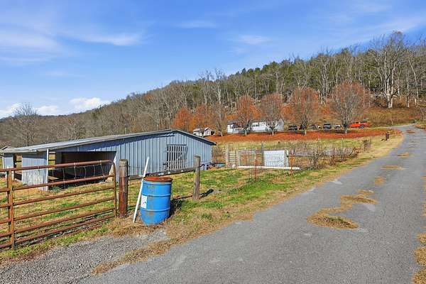 5.36 Acres of Land with Home for Sale in Dowelltown, Tennessee