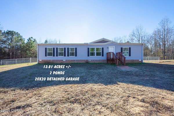 13.8 Acres of Land with Home for Sale in Beech Bluff, Tennessee