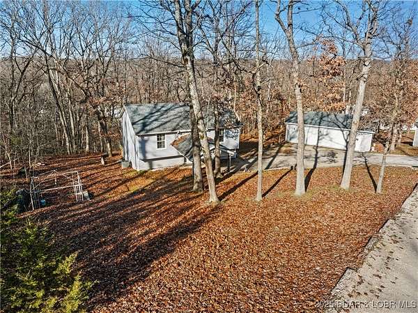 4.1 Acres of Residential Land with Home for Sale in Linn Creek, Missouri