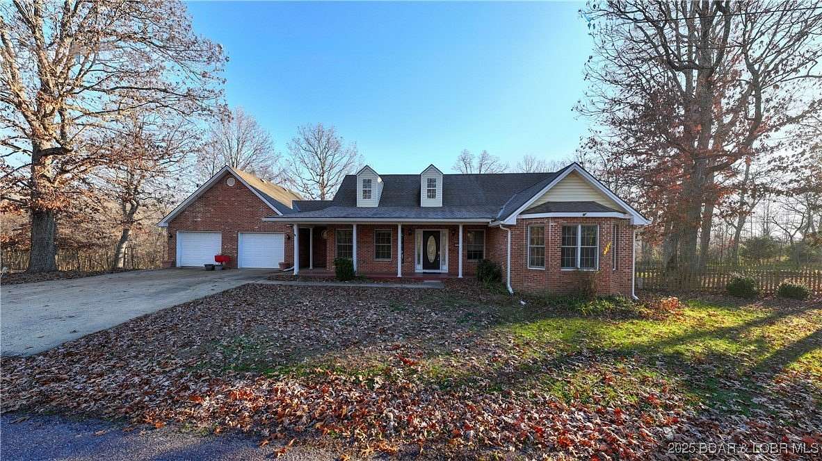 6 Acres of Residential Land with Home for Sale in Gravois Mills, Missouri