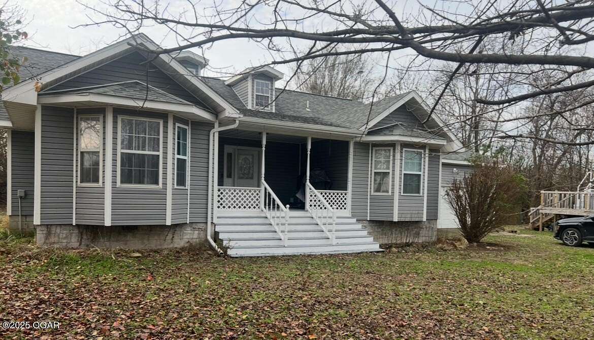 5 Acres of Residential Land with Home for Sale in Carthage, Missouri