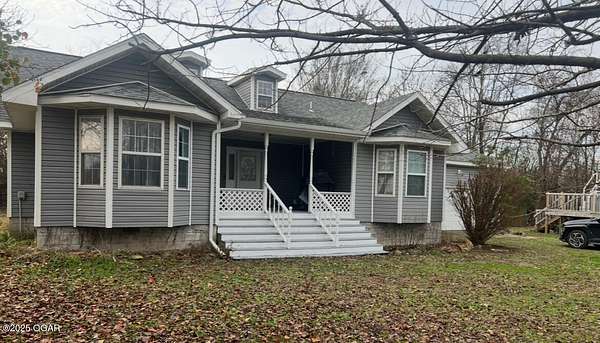 5 Acres of Residential Land with Home for Sale in Carthage, Missouri