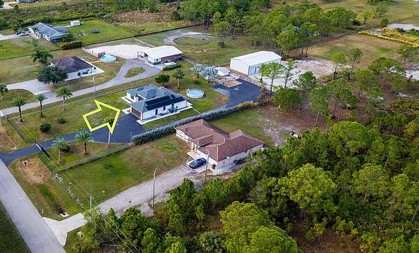 1.59 Acres of Residential Land with Home for Sale in Naples, Florida