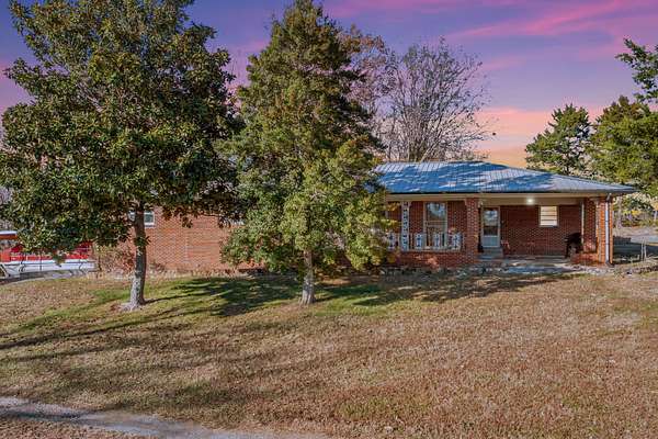 4 Acres of Residential Land with Home for Sale in Cunningham, Tennessee