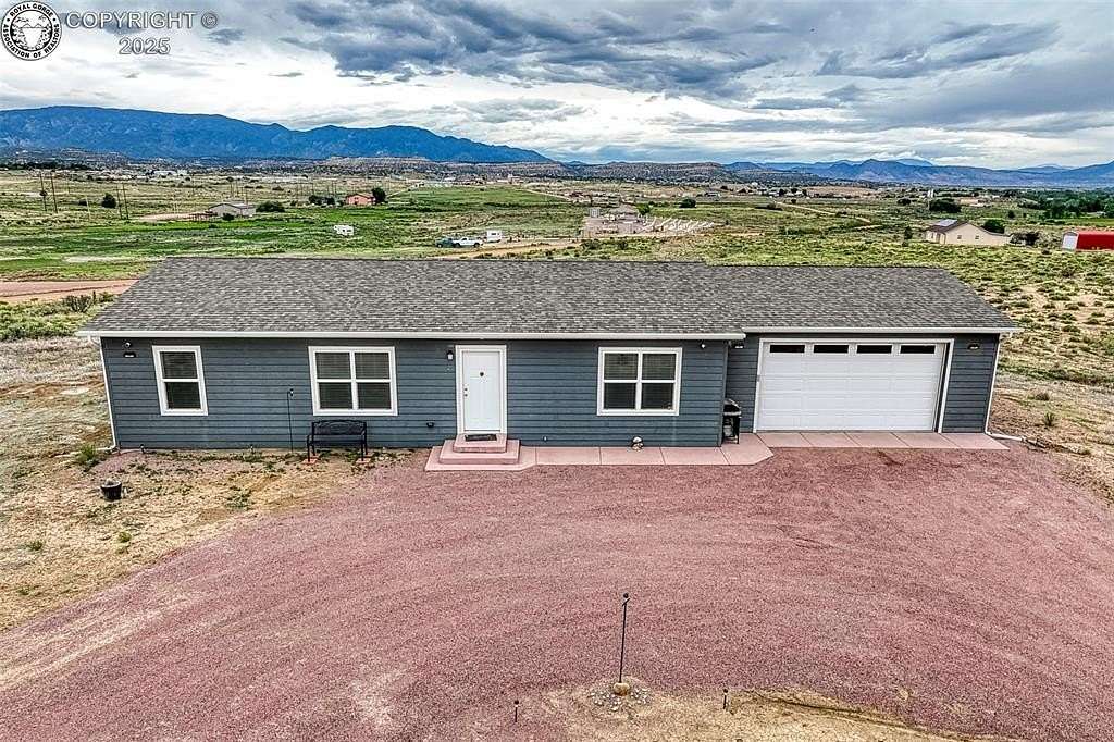 3.77 Acres of Residential Land with Home for Sale in Florence, Colorado