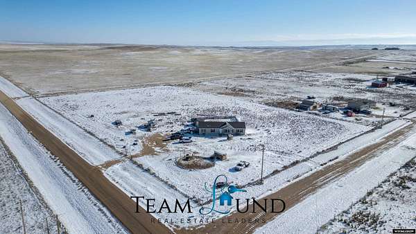5.25 Acres of Residential Land with Home for Sale in Evansville, Wyoming