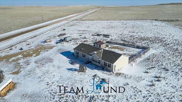 5.25 Acres of Land with Home for Sale in Evansville, Wyoming