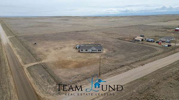 5.25 Acres of Land with Home for Sale in Evansville, Wyoming
