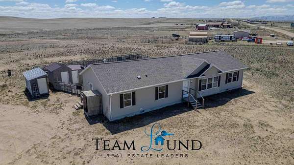 5.25 Acres of Land with Home for Sale in Evansville, Wyoming