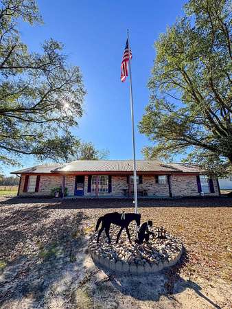 78.5 Acres of Agricultural Land with Home for Sale in Daingerfield, Texas