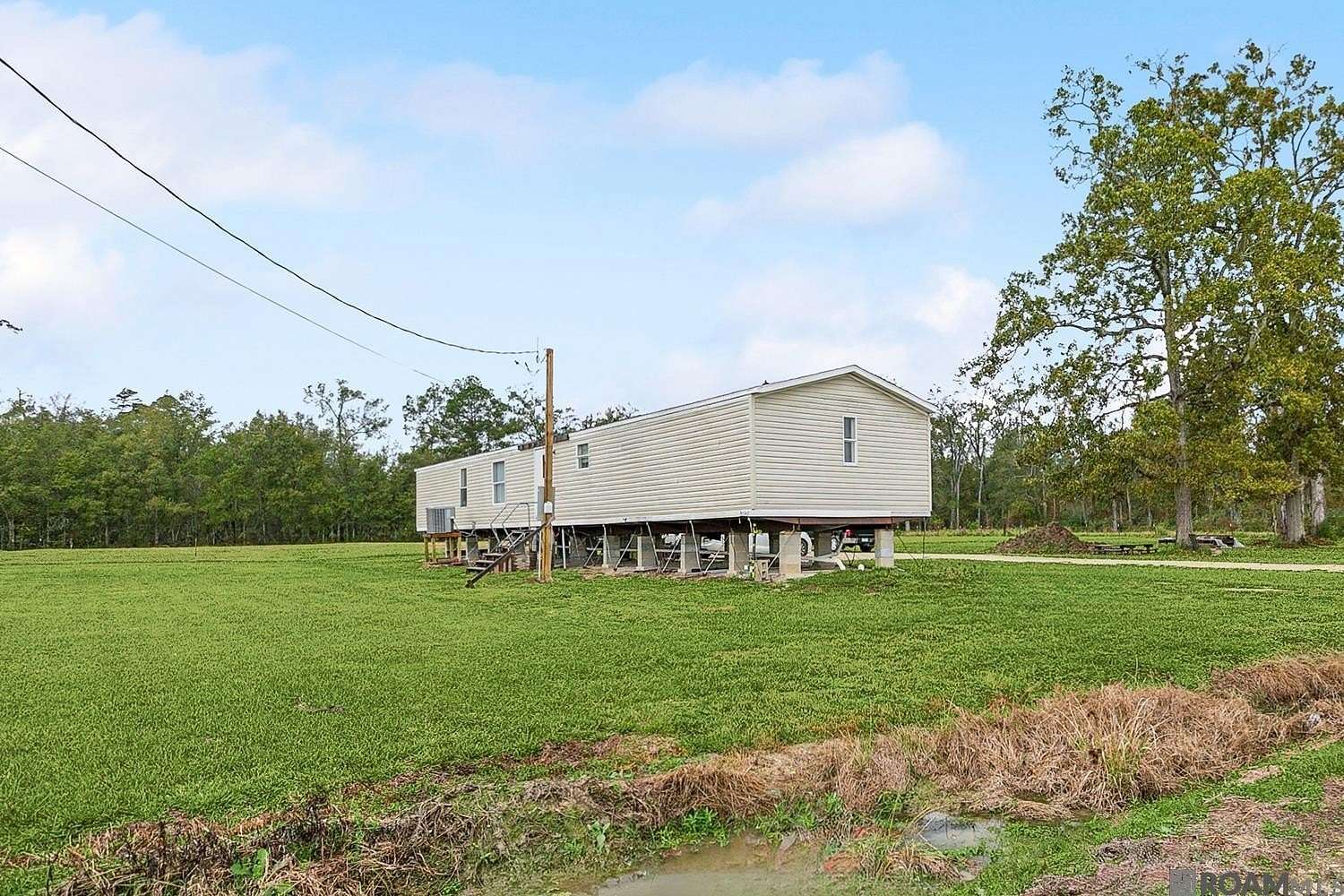 2.83 Acres of Land with Home for Sale in Saint Amant, Louisiana