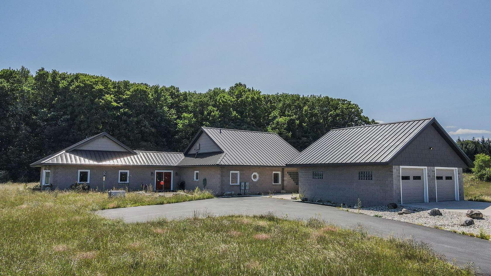 39 Acres of Land with Home for Sale in Brethren, Michigan