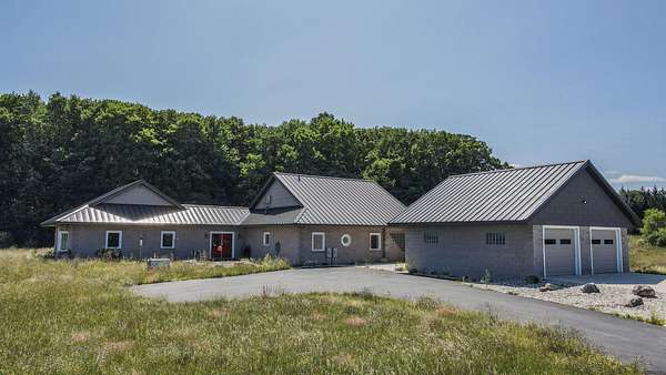 39 Acres of Land with Home for Sale in Brethren, Michigan