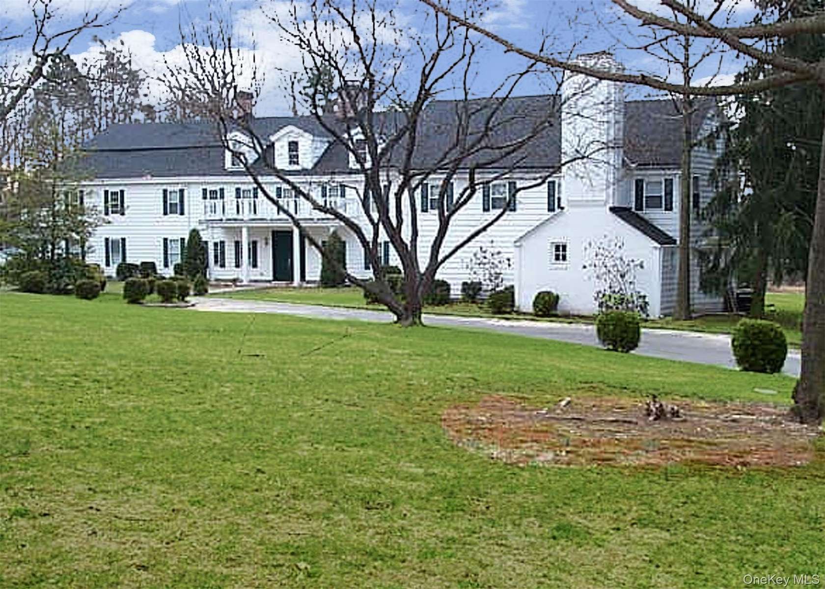 2.42 Acres of Residential Land with Home for Sale in Old Westbury, New York