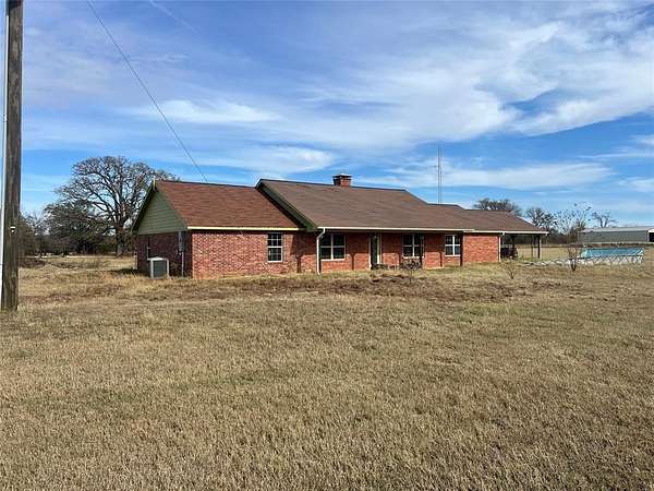 2.5 Acres of Residential Land with Home for Sale in Telephone, Texas