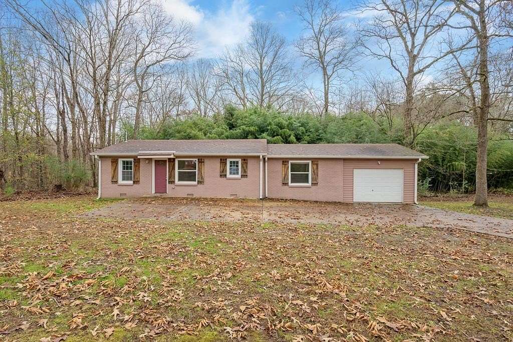 2.25 Acres of Residential Land with Home for Sale in Camden, Tennessee