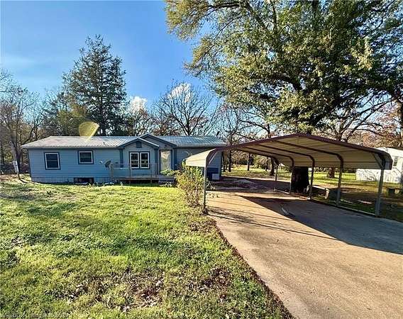 1.8 Acres of Residential Land with Home for Sale in Poteau, Oklahoma