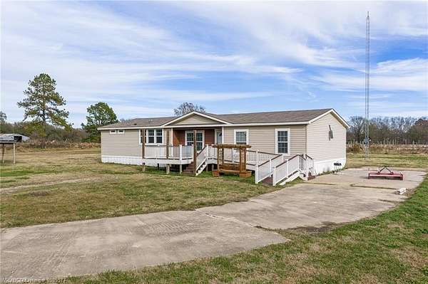 10 Acres of Land with Home for Sale in Gans, Oklahoma