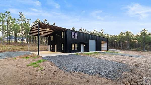 9.36 Acres of Residential Land with Home for Sale in Queen City, Texas