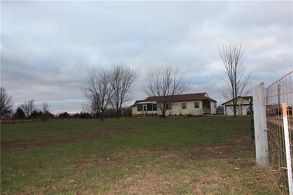 6.6 Acres of Residential Land with Home for Sale in Burlingame, Kansas