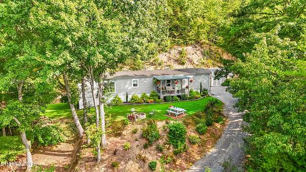 3.8 Acres of Residential Land with Home for Sale in Sevierville, Tennessee