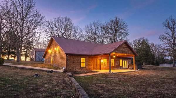 8.7 Acres of Land with Home for Sale in Laquey, Missouri