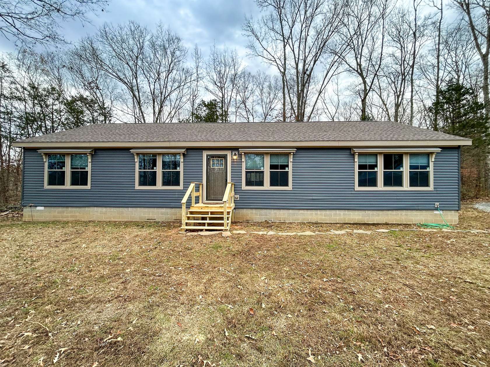 39.6 Acres of Recreational Land with Home for Sale in McKenzie, Tennessee