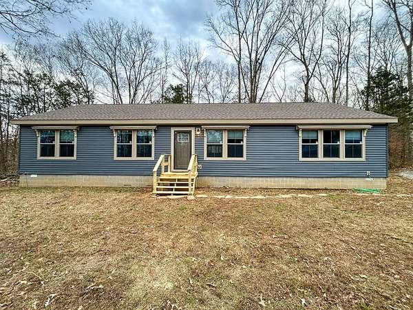 39.6 Acres of Land with Home for Sale in McKenzie, Tennessee