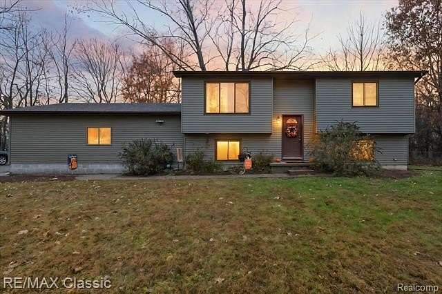 2.7 Acres of Residential Land with Home for Sale in Holt, Michigan