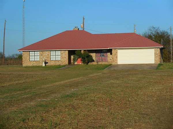 11.6 Acres of Land with Home for Sale in Commerce, Texas