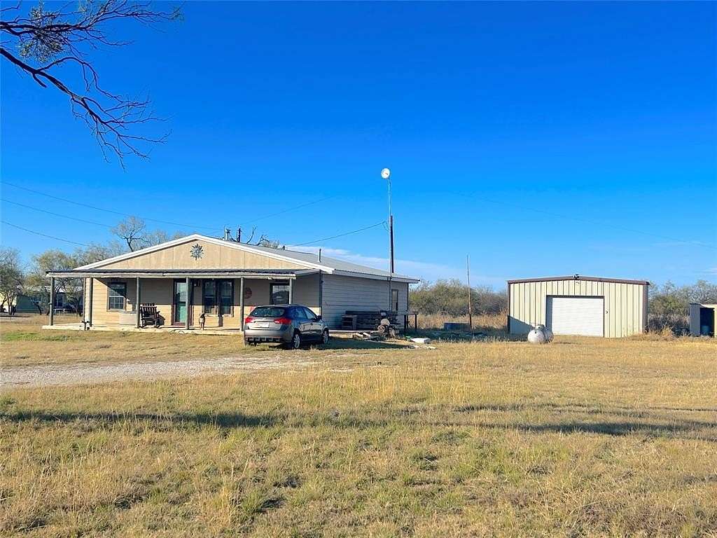 5.2 Acres of Residential Land with Home for Sale in Graham, Texas
