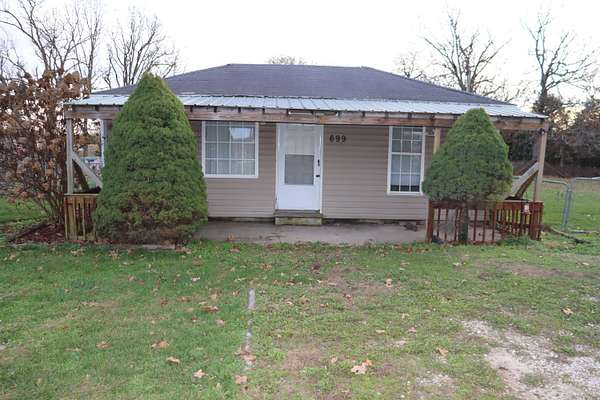 0.79 Acres of Residential Land with Home for Sale in Seymour, Missouri