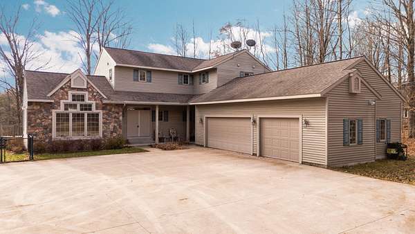 2.36 Acres of Land with Home for Sale in Thompsonville, Michigan