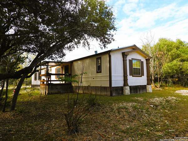 2.49 Acres of Residential Land with Home for Sale in Lakehills, Texas