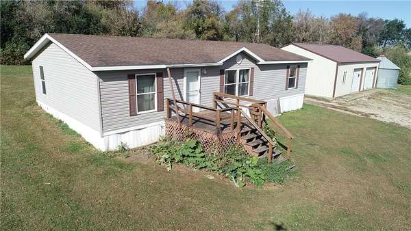 9.19 Acres of Land with Home for Sale in Elbow Lake, Minnesota