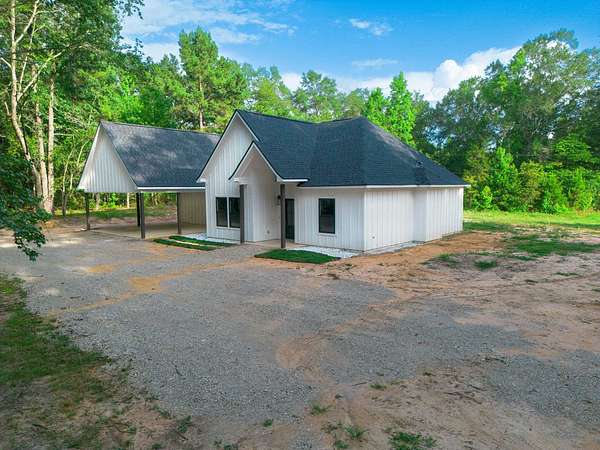 9.59 Acres of Residential Land with Home for Sale in Harleton, Texas