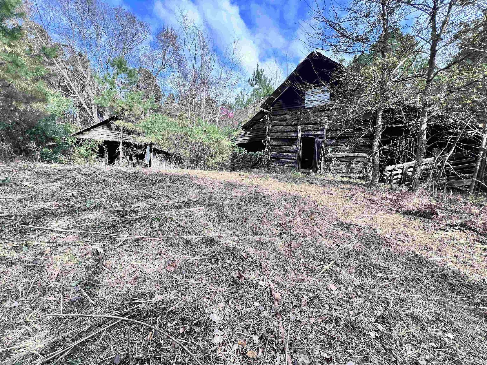16.1 Acres of Land for Sale in Wildersville, Tennessee