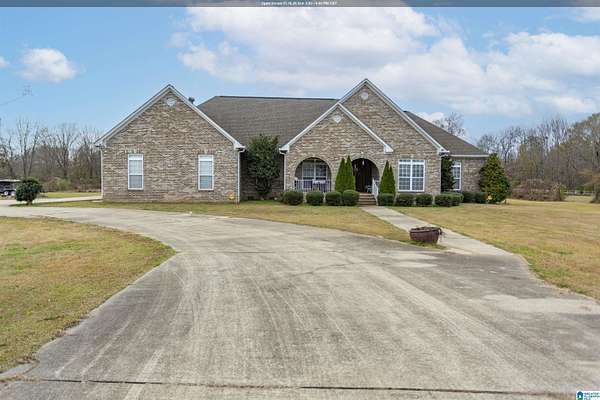 5.6 Acres of Residential Land with Home for Sale in McCalla, Alabama