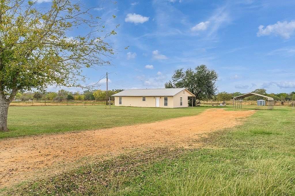 6.75 Acres of Land with Home for Sale in Smithville, Texas