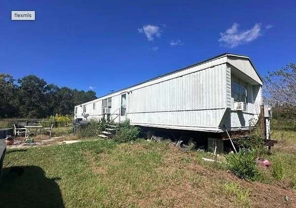 10 Acres of Residential Land with Home for Sale in Lake City, Florida