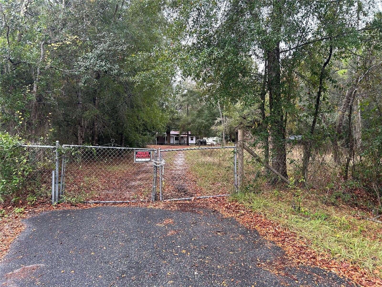 2.45 Acres of Residential Land with Home for Sale in Morriston, Florida