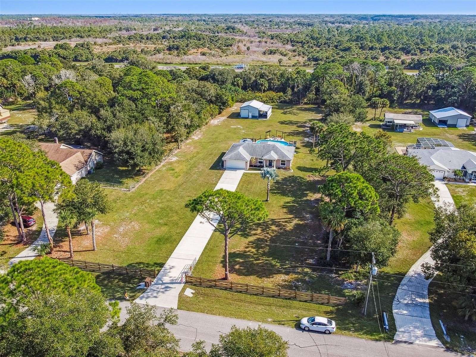 1.63 Acres of Residential Land with Home for Sale in Cocoa, Florida