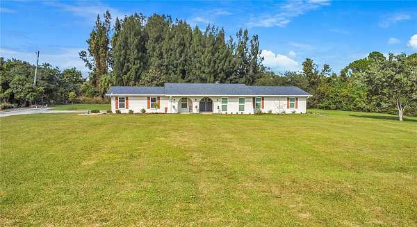 1.58 Acres of Residential Land with Home for Sale in Merritt Island, Florida